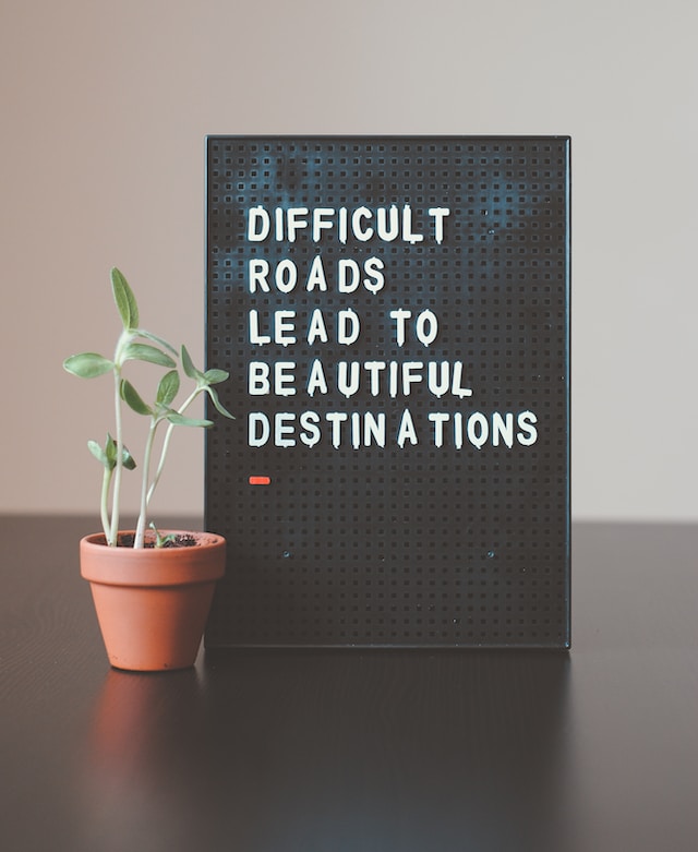 Poster displaying a sign "Difficult Roads lead to beautiful destinations"
Fluent Bridges Blog - Virtual Assistance & Self Reinvention